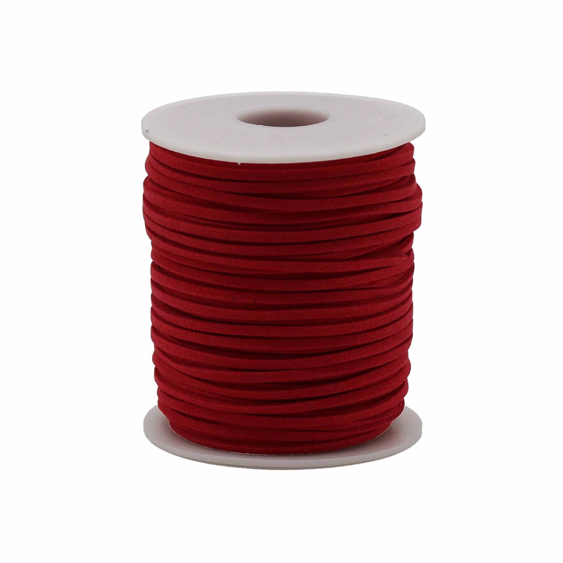 Large bulk roll of vibrant red faux suede jewellery cord on a black plastic spool for crafting and pendant making.