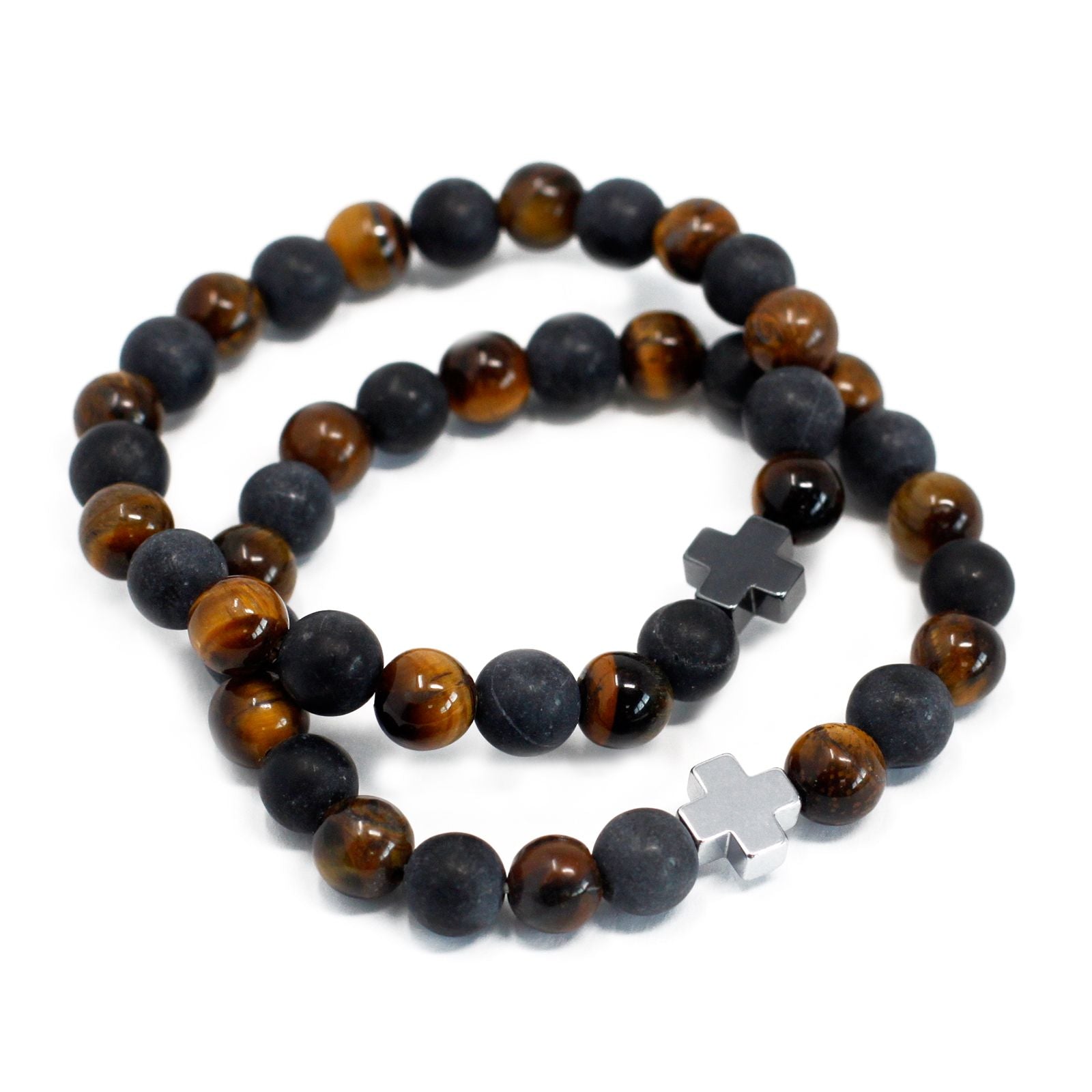 Two beaded stretch bracelets featuring golden brown tiger eye and matte black stones on a neutral background.
