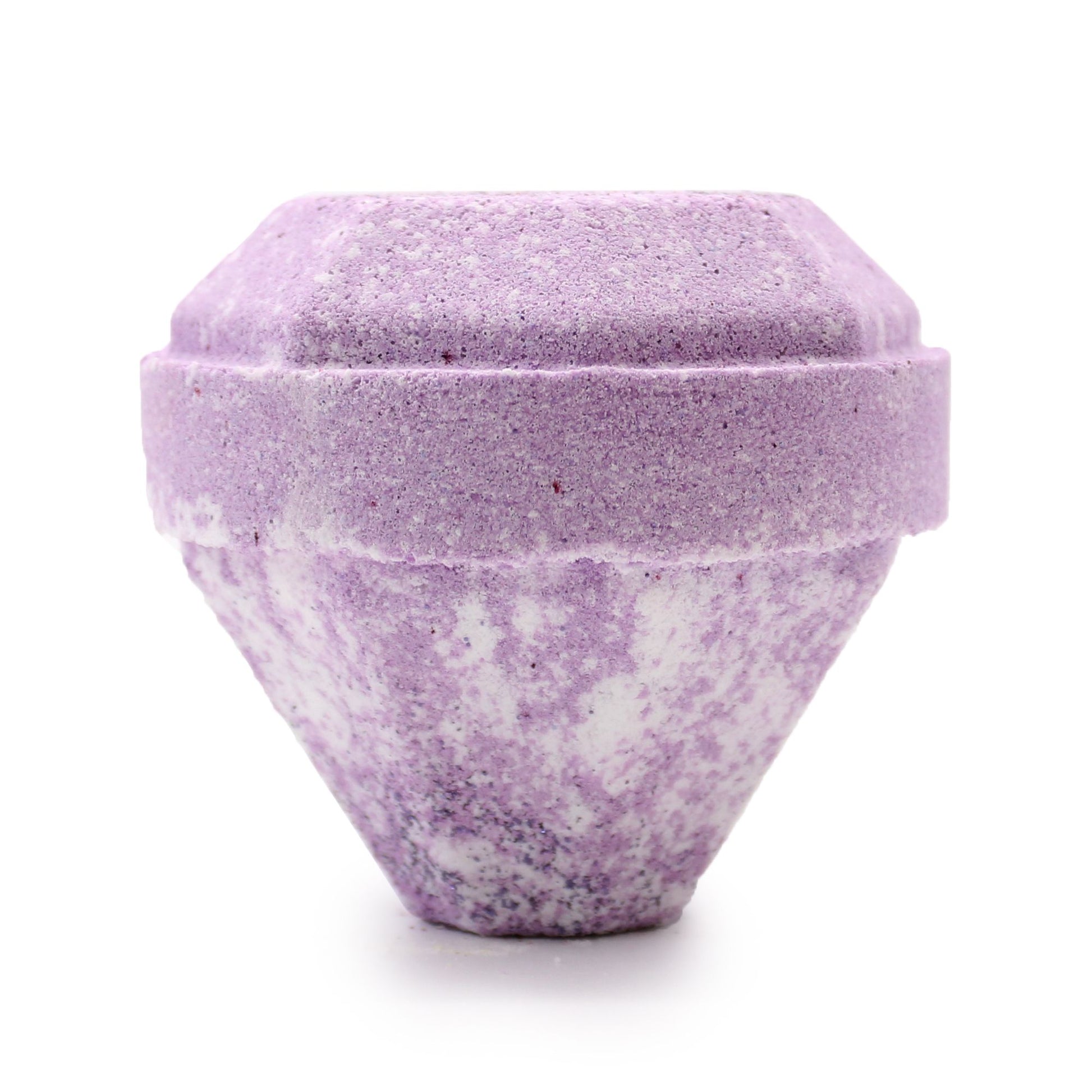 Large faceted gemstone-shaped bath bomb in white and purple with a shimmering glossy finish.