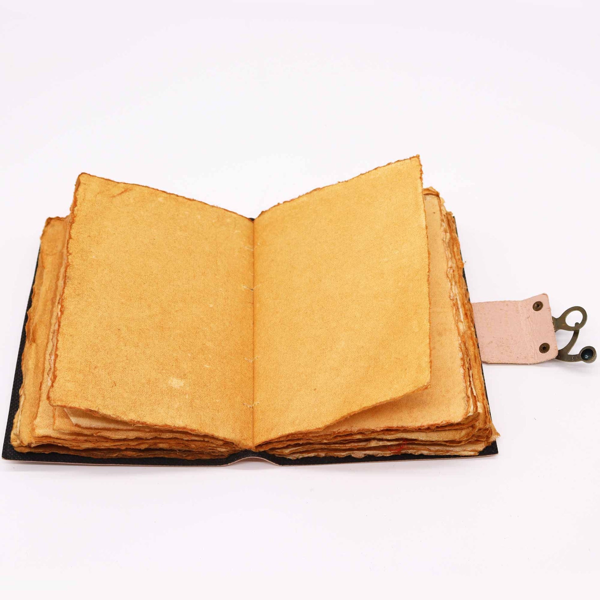 Handcrafted leather journal with colourful chakra symbols embossed on the cover and a vintage metal clasp.