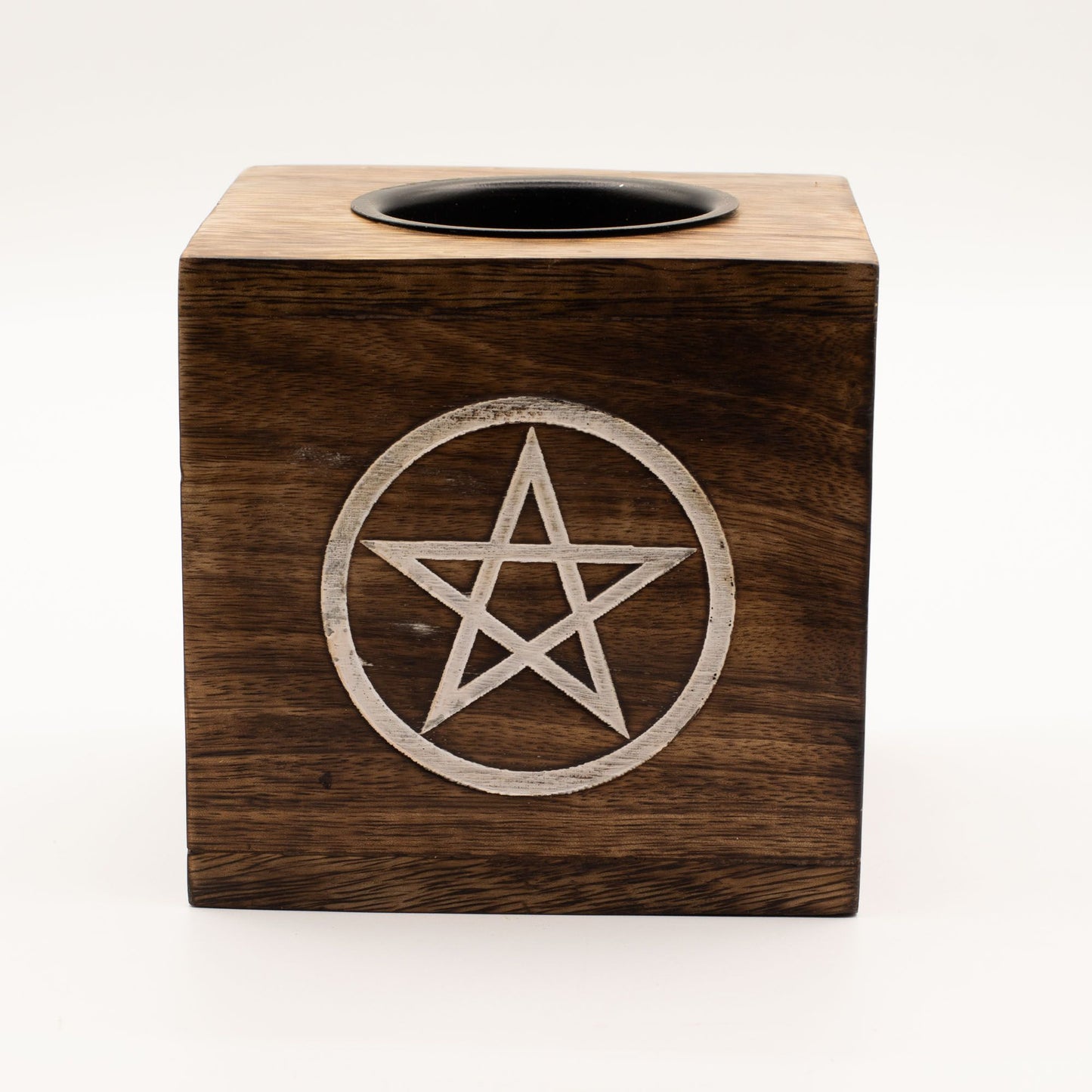 Large square handcrafted mango wood oil burner featuring an engraved five-sided pentagonal motif in the natural timber.