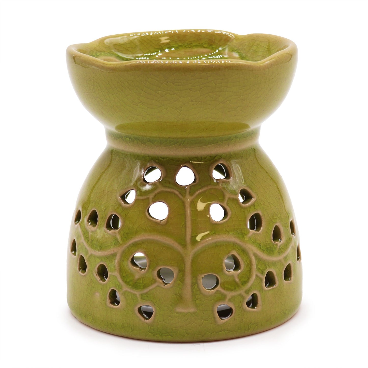 Vibrant lime green ceramic oil burner featuring a decorative cutout Tree of Life design and a glossy glazed finish.