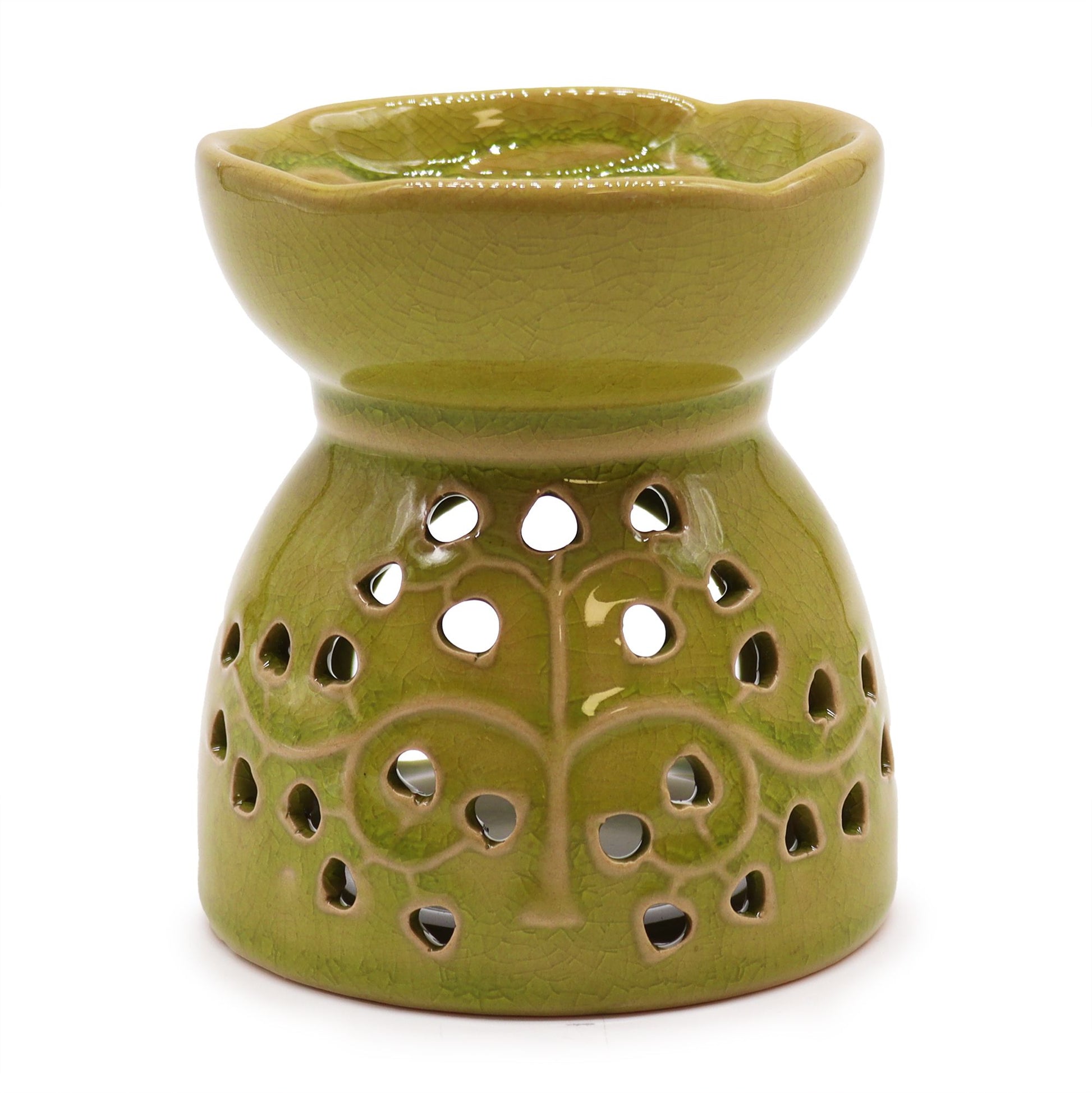 Vibrant lime green ceramic oil burner featuring a decorative cutout Tree of Life design and a glossy glazed finish.