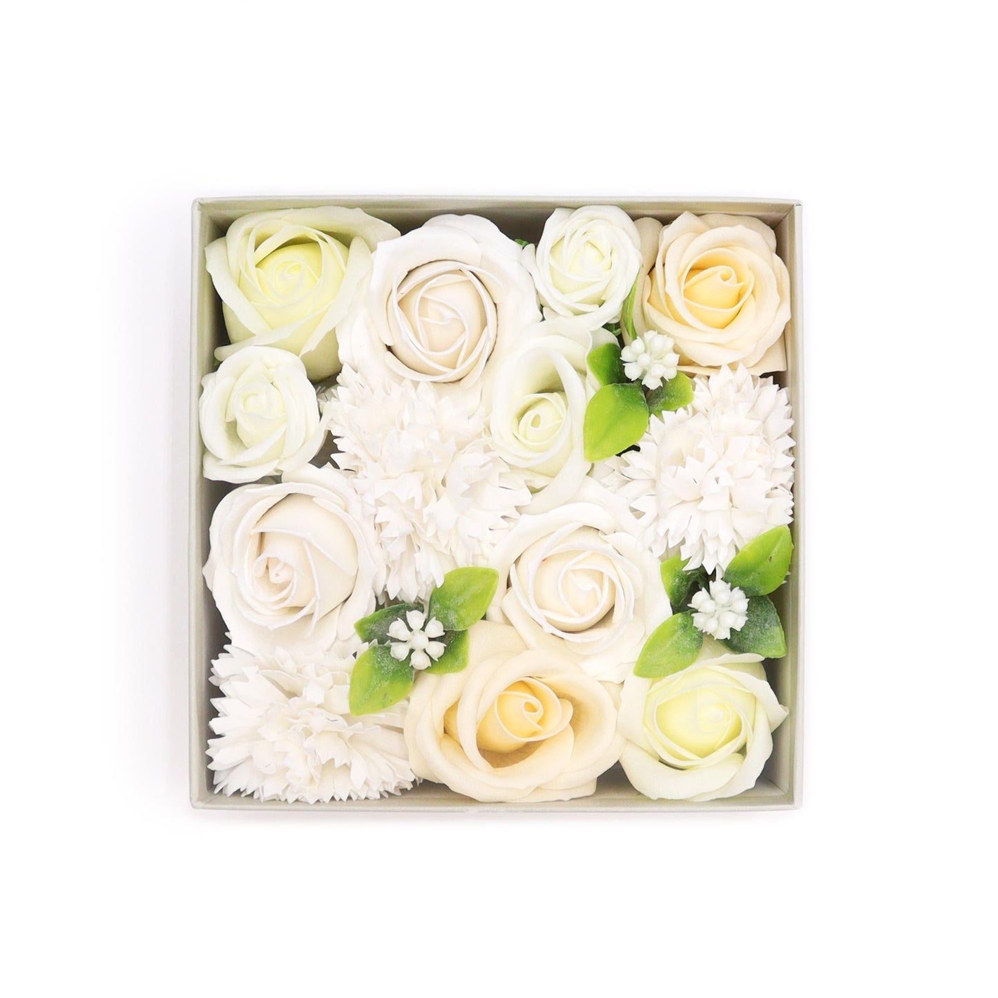 Elegant square gift box filled with realistic white and ivory soap roses and carnations.