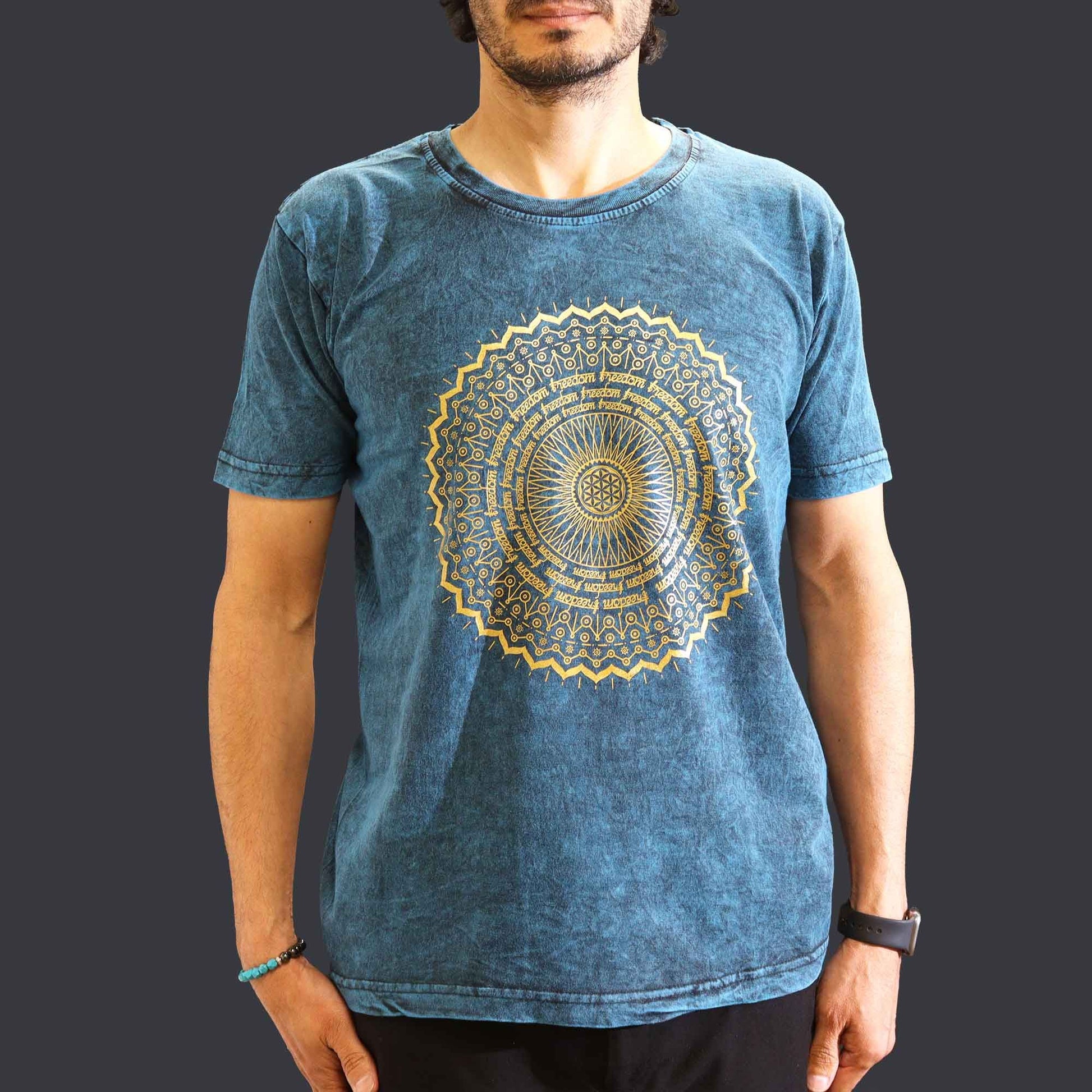 Blue stone washed t-shirt with a central white mandala print and a relaxed nomad aesthetic.