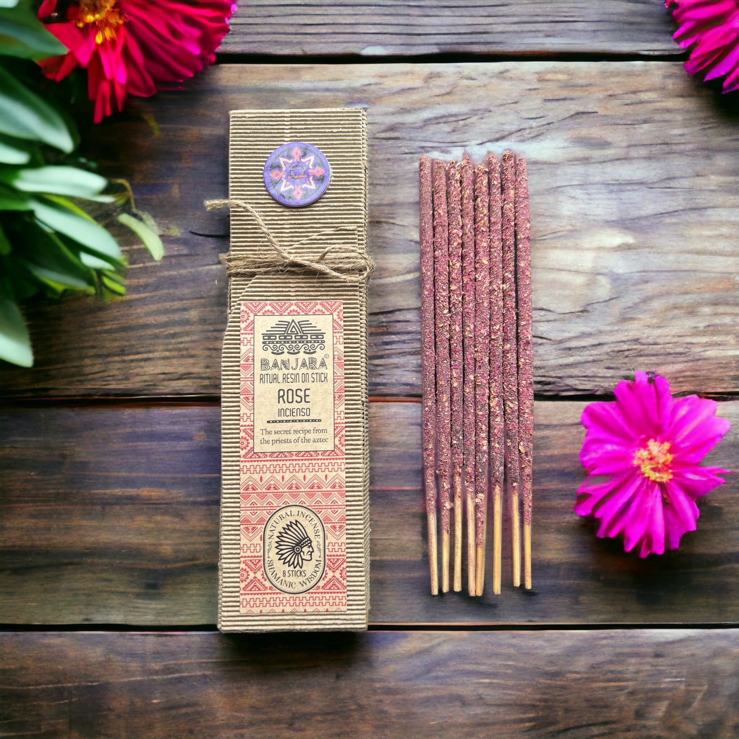 Handcrafted rose resin incense stick showing a thick natural resin coating for a long-lasting floral fragrance.