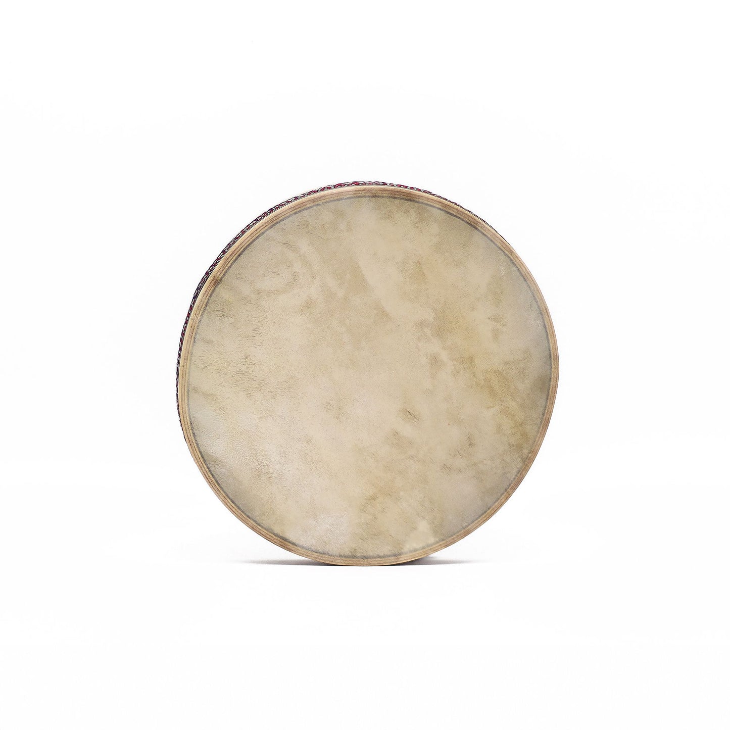 Handcrafted 30cm frame drum with goatskin head and decorative patterned frame, designed to create soothing ocean wave sounds.