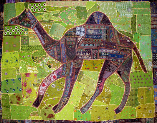 Large ethnic style wall hanging featuring a detailed camel motif in a traditional patterned design.