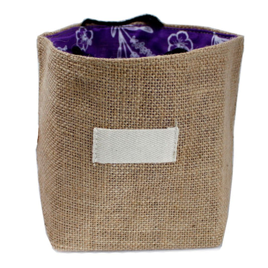 Large eco-friendly natural jute gift bag featuring a soft lavender cotton lining and sturdy handles.