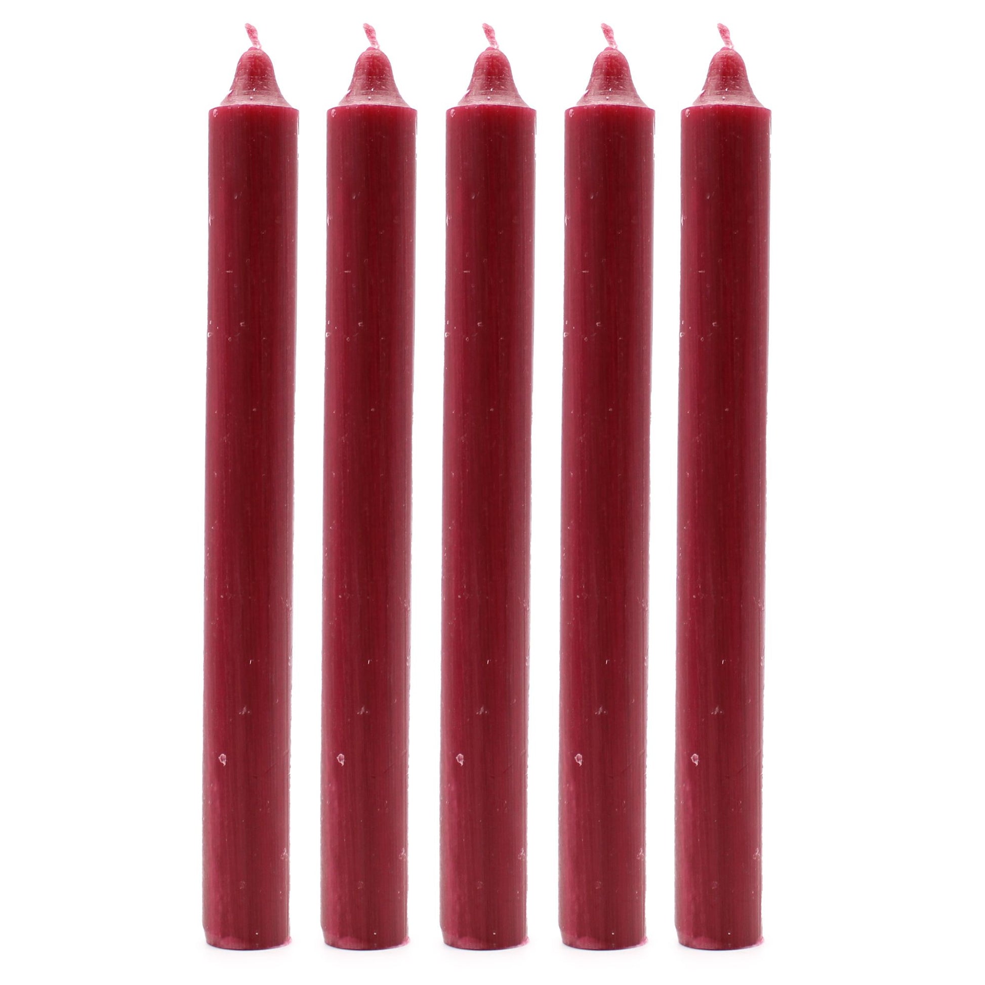 Five tall hand-drawn rustic burgundy dinner candles bundled together on a neutral background.