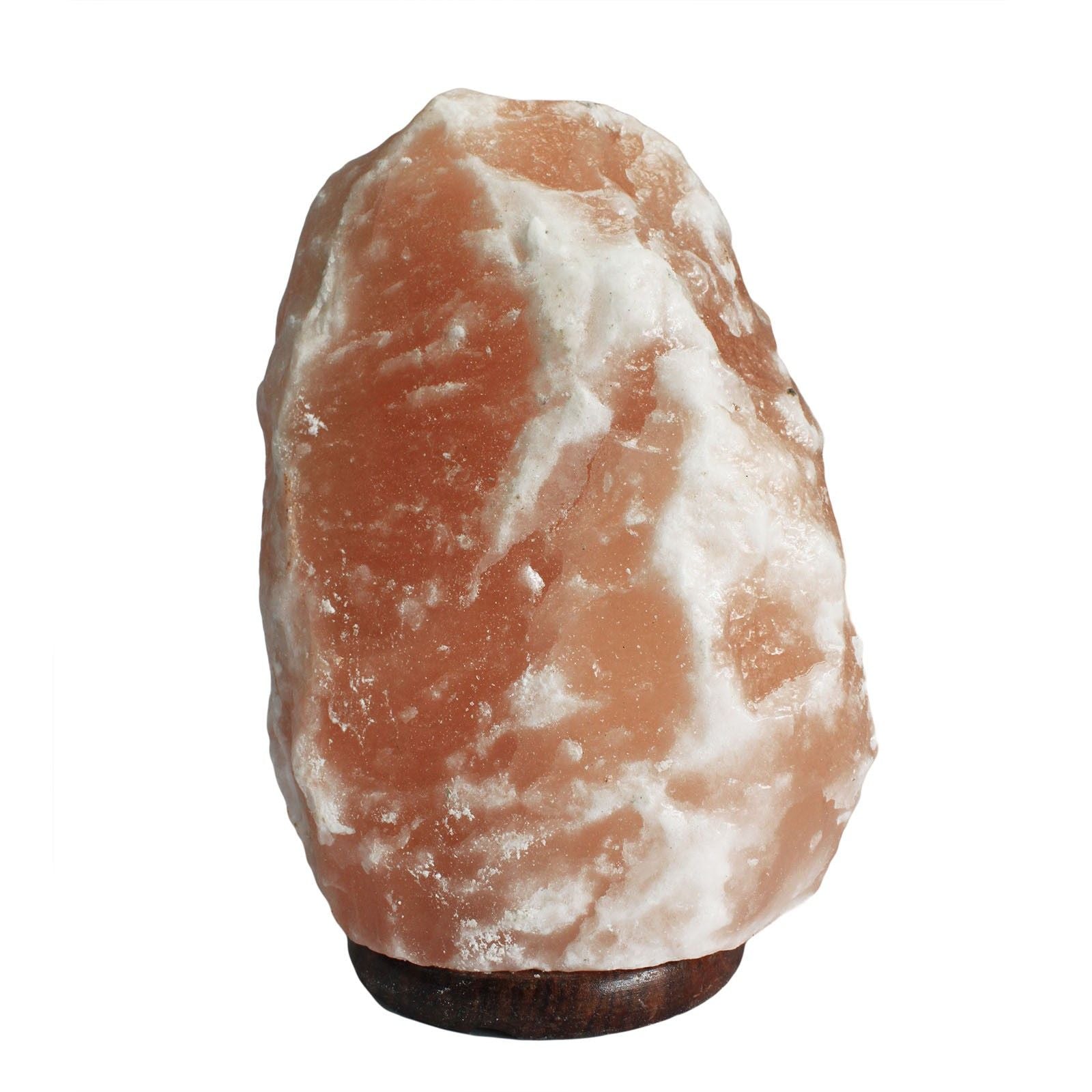 Large natural-shaped orange Himalayan salt lamp on a wooden base emitting a warm amber glow.