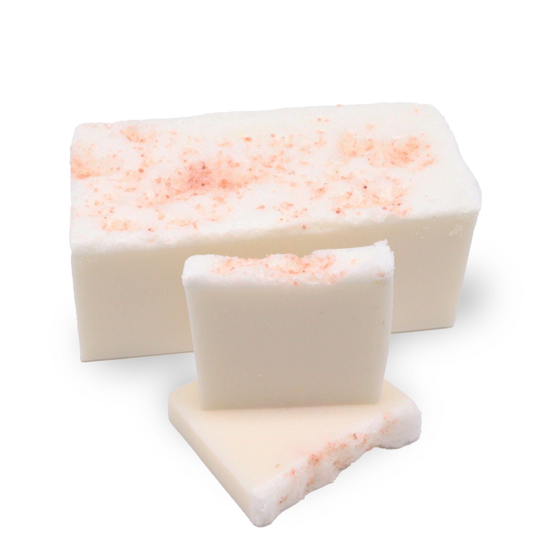 Hand-crafted white soap loaf with a whipped top texture sprinkled with pink Himalayan salt crystals.