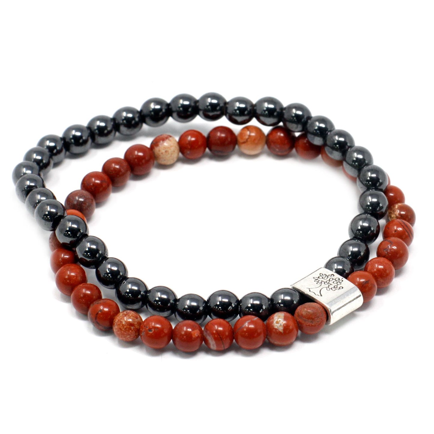 Close-up of a deep red gemstone bead bracelet with magnetic properties on a stretchy band.