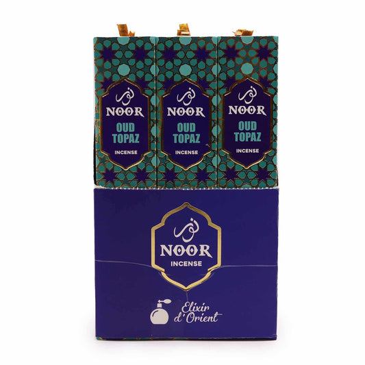 Hand-rolled incense sticks with a rich woody texture, ideal for creating a calming atmosphere during meditation.