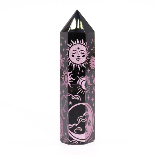 Polished black obsidian crystal point with delicate rose pink celestial engravings.