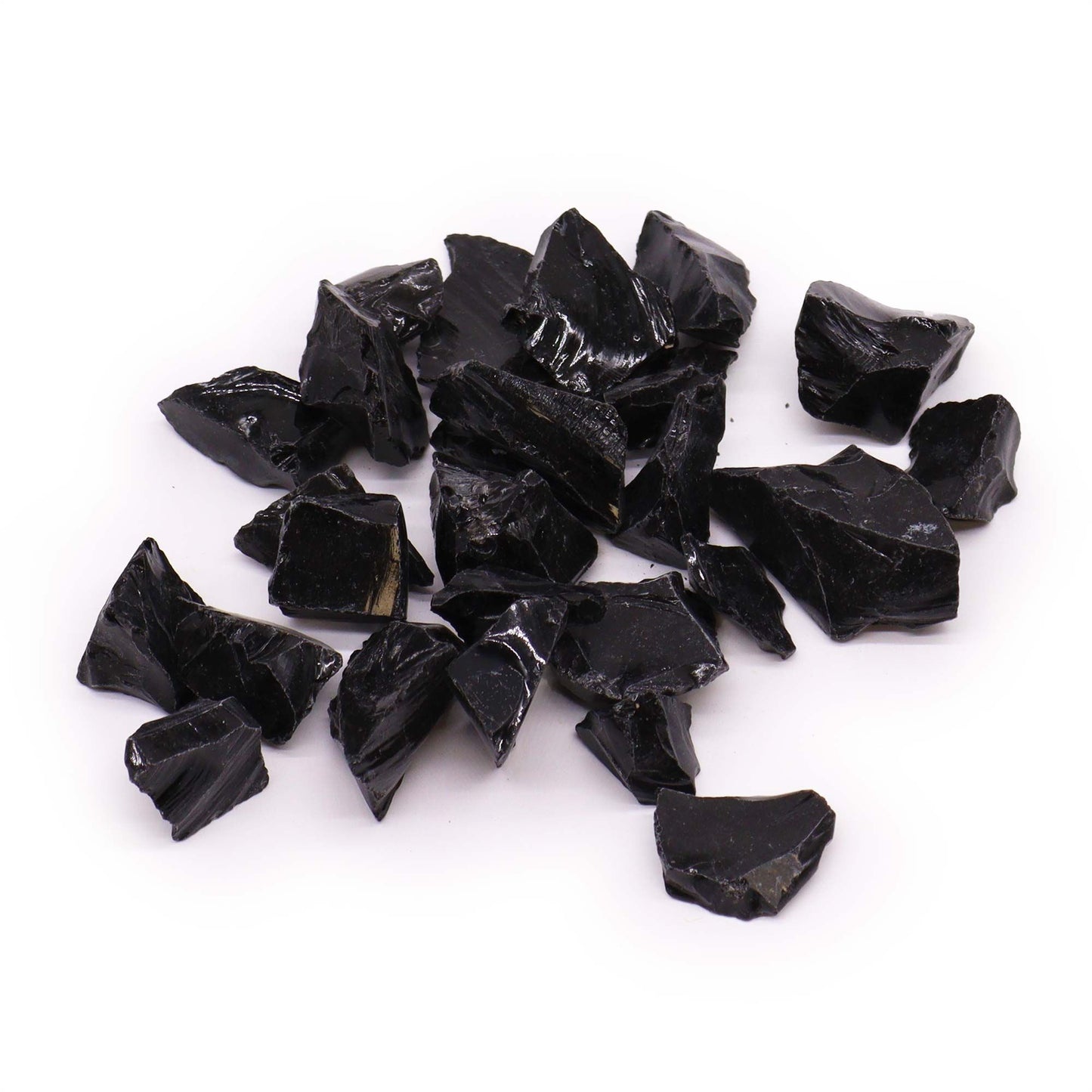 A collection of raw black agate crystals showing natural dark hues and unique textured patterns.