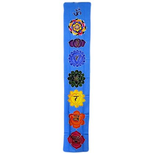 Long sky blue batik wall hanging featuring colourful chakra symbols handcrafted with traditional wax and natural dyes.