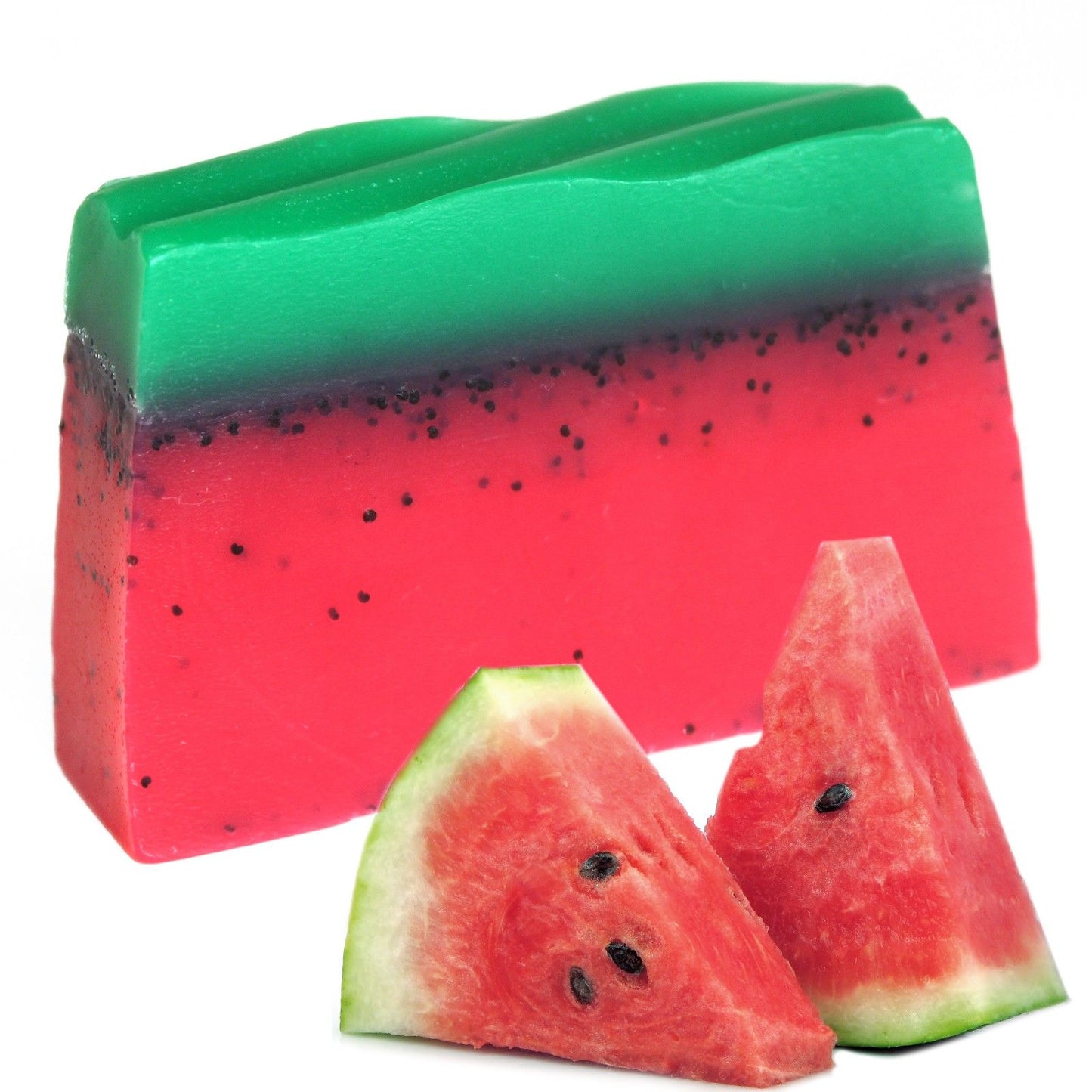 Handcrafted tropical watermelon soap loaf with exfoliating poppy seeds and vibrant pink and green layers.