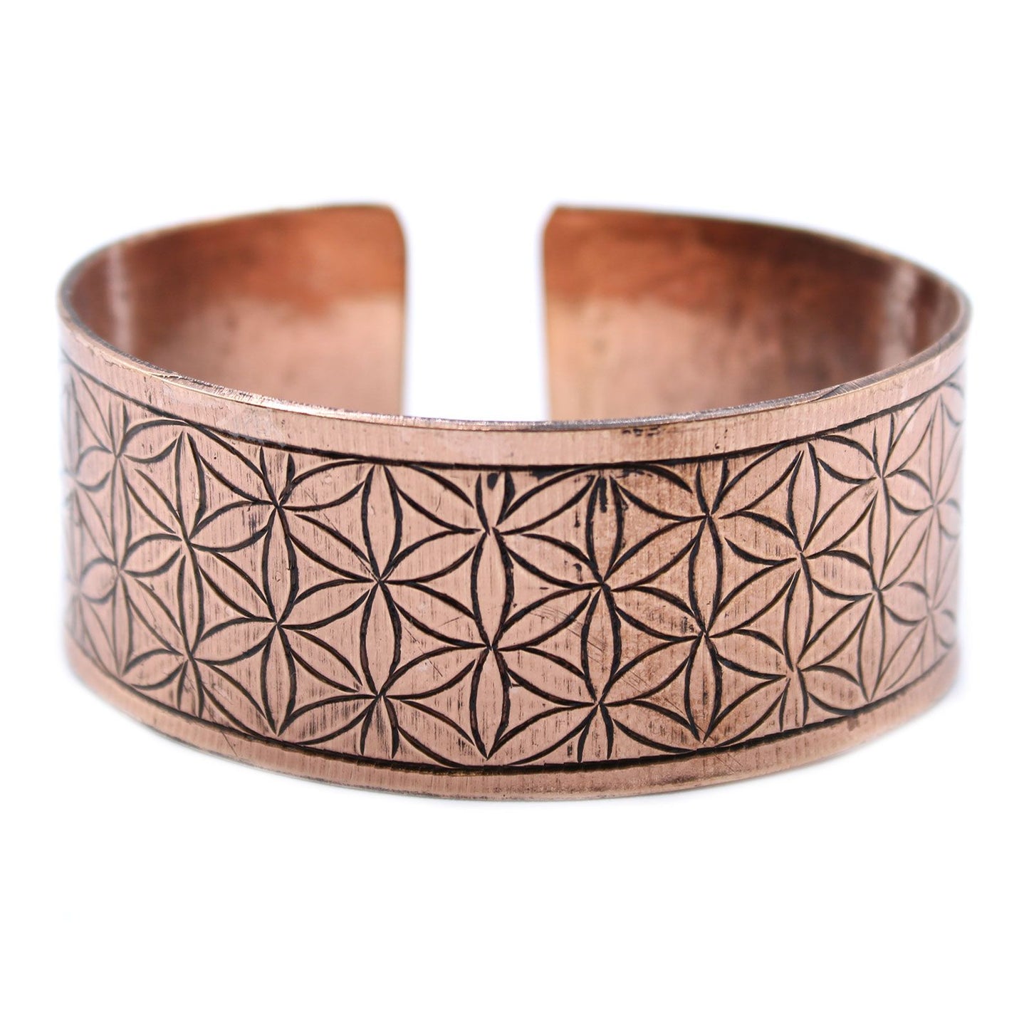 Adjustable copper Tibetan cuff bracelet engraved with the sacred geometry Flower of Life symbol.