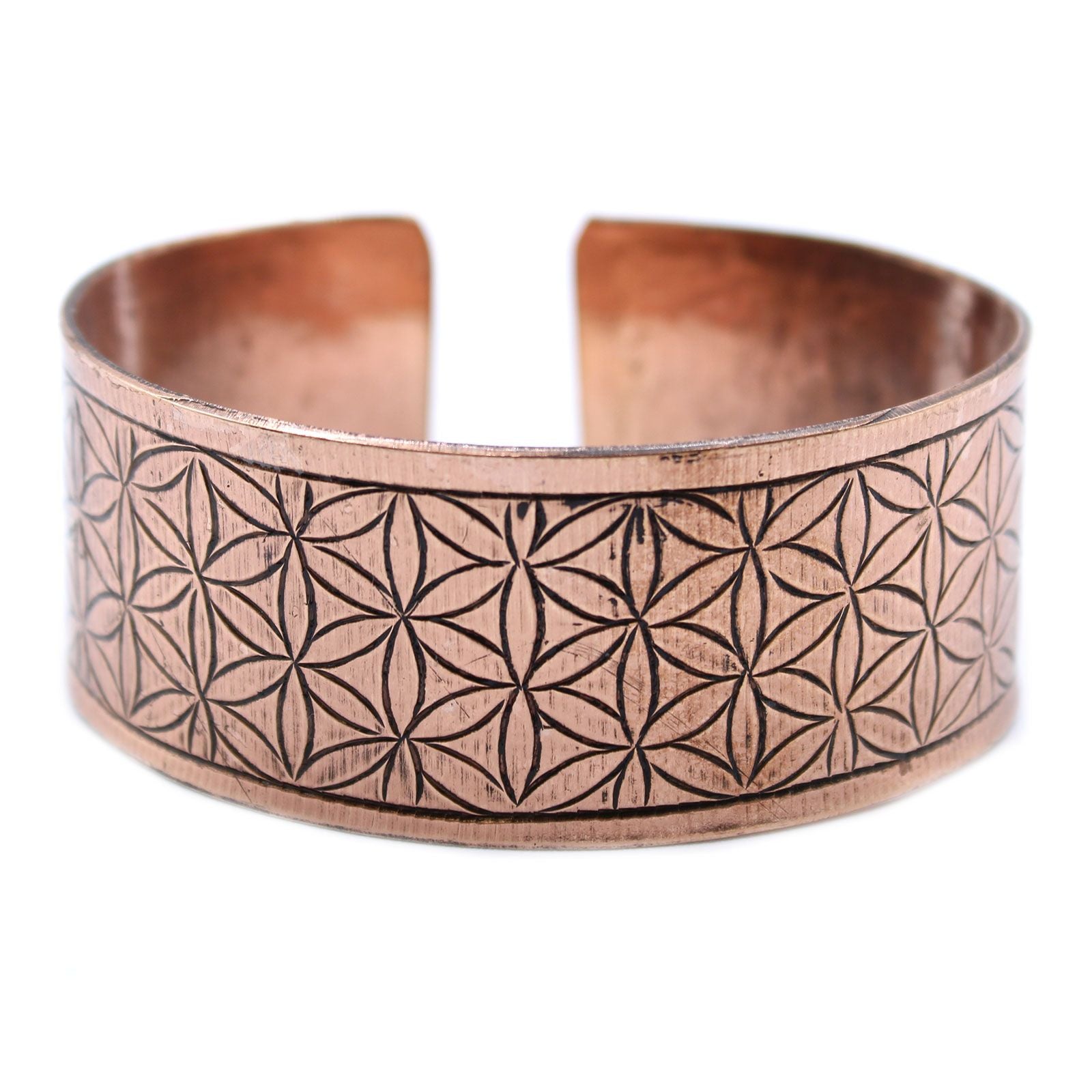 Adjustable copper Tibetan cuff bracelet engraved with the sacred geometry Flower of Life symbol.