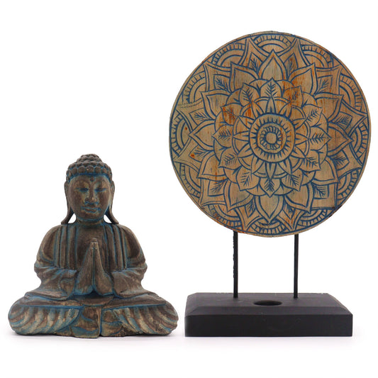 Serene blue Buddha statue with an intricate floral mandala pattern backdrop in a decorative Feng Shui gift set.