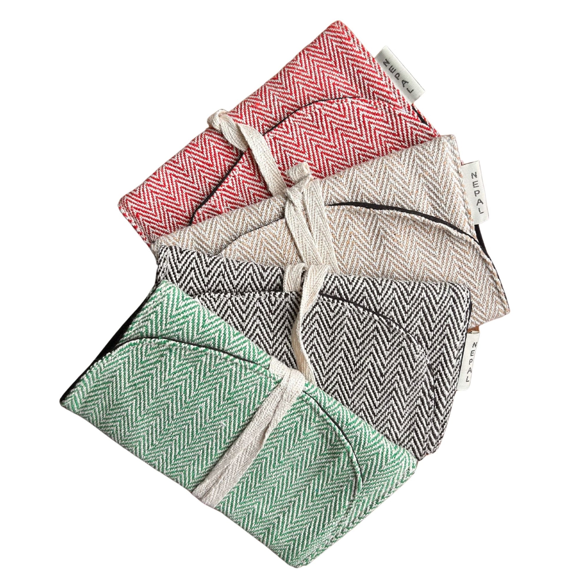 Handcrafted hemp wrap pouch featuring an assorted woven pattern and a secure fold-over closure.