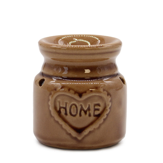 Elegant colourful ceramic oil burner with a decorative cut-out design for wax melts and fragrance oils.