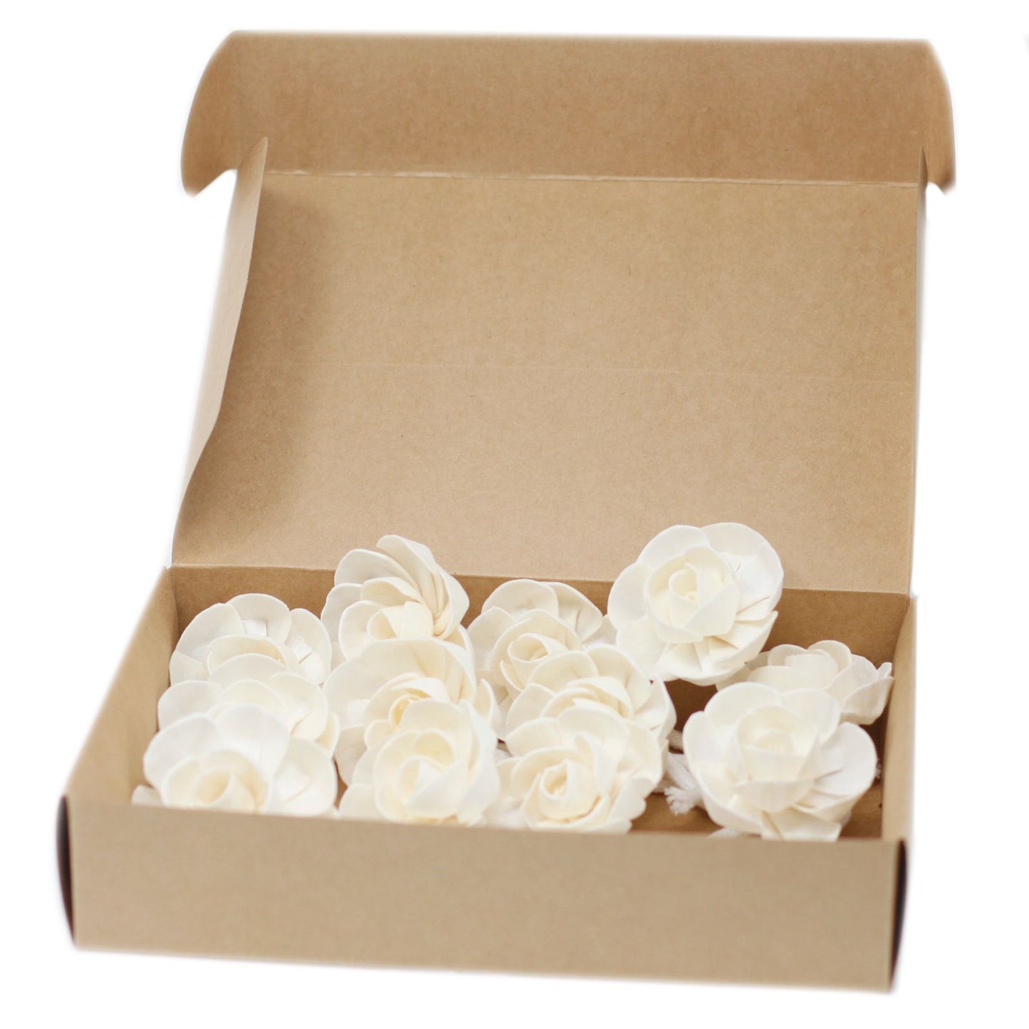 Handcrafted small lotus flower made from white sola wood with an attached cotton string for fragrance diffusion.