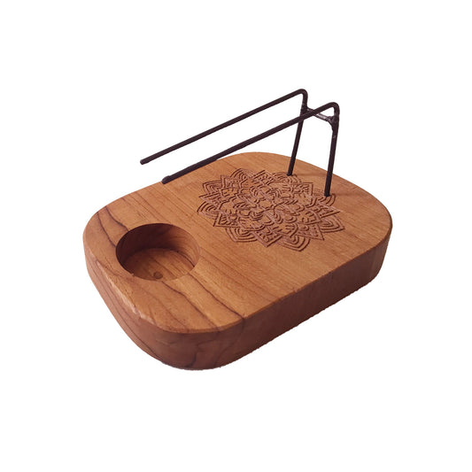 Handcrafted teak wood Palo Santo heater with an intricate carved mandala design for spiritual smudging and aromatherapy.