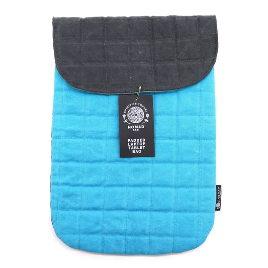 Padded turquoise stonewashed cotton laptop pouch with a charcoal magnetic flap and quilted texture.