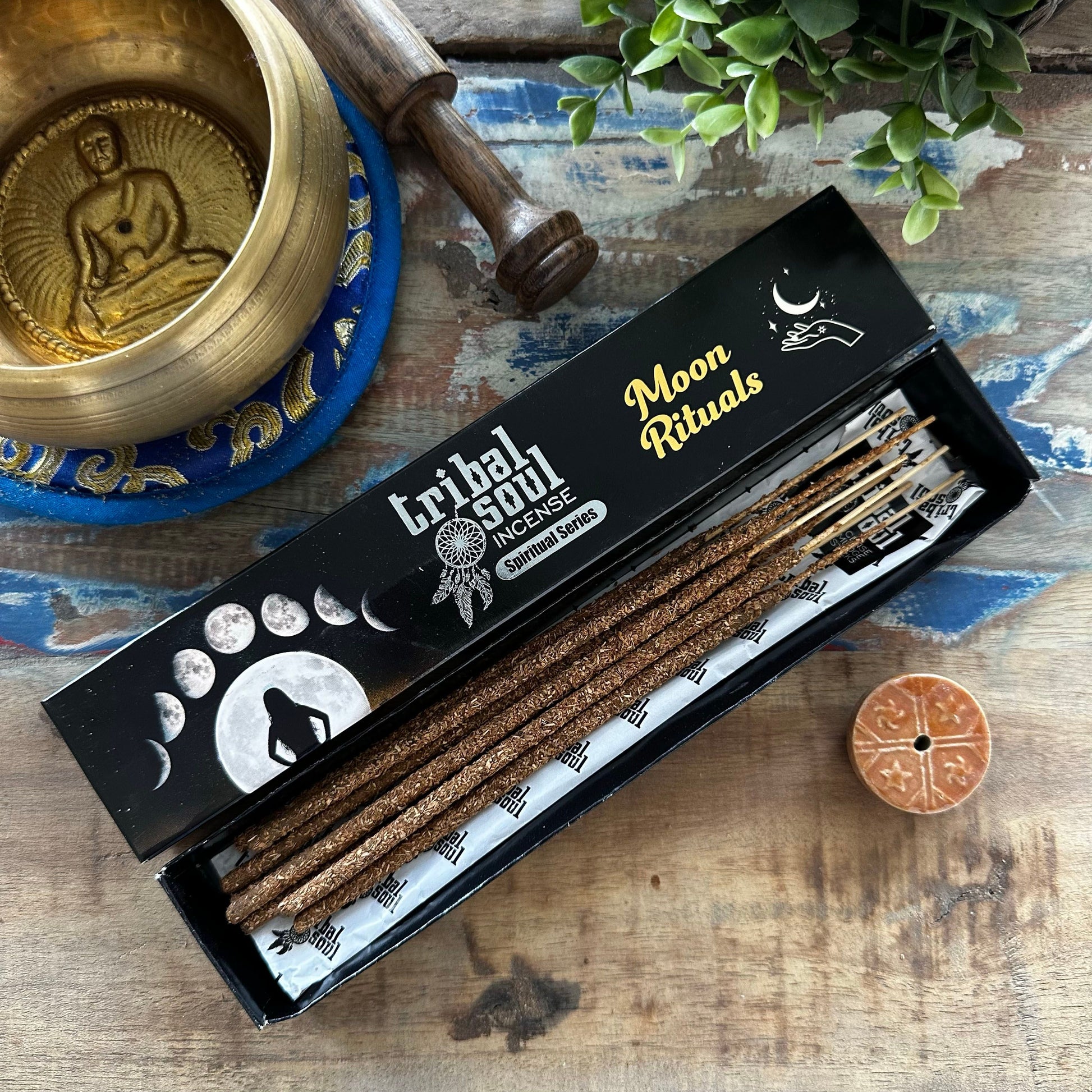 Handcrafted incense sticks with a minimalist ceramic holder featuring a celestial moon ritual theme.