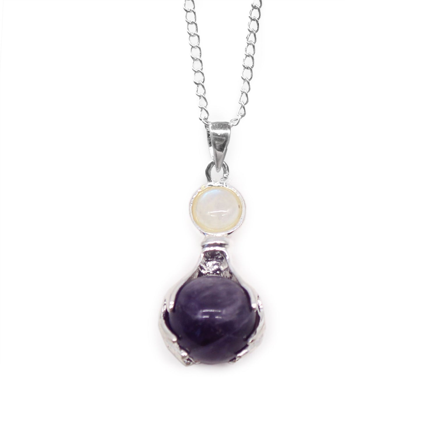 Handcrafted Amethyst gemstone sphere held by silver-toned healing hands on a pendant.