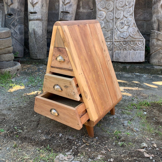 Hand-crafted triangle-shaped wooden chest with three drawers made from rustic upcycled teak wood with natural grain finish.
