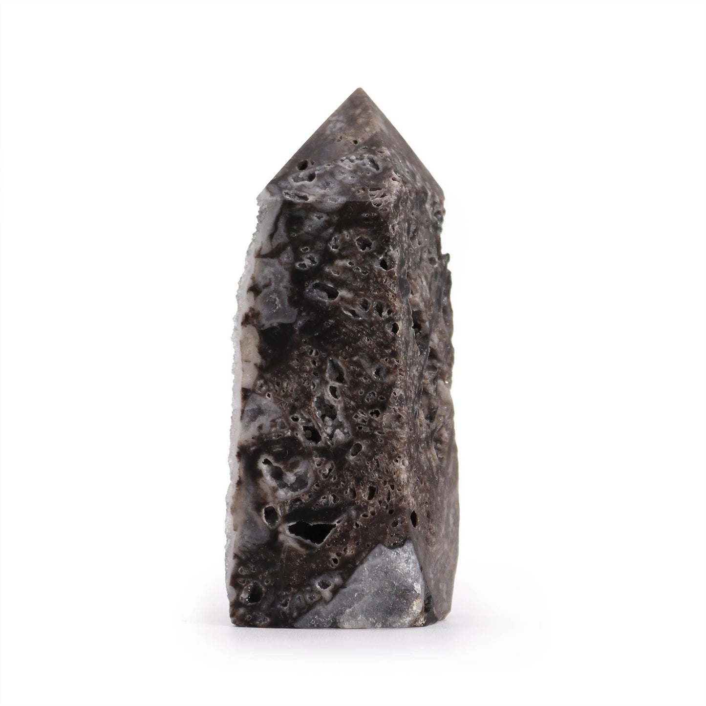 Natural calcite crystal tower with a unique vertical side polish showcasing intricate raw and smooth stone textures.