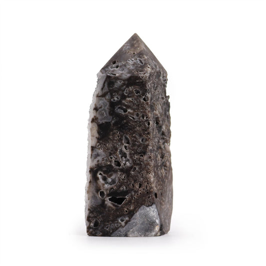 Natural calcite crystal tower with a unique vertical side polish showcasing intricate raw and smooth stone textures.