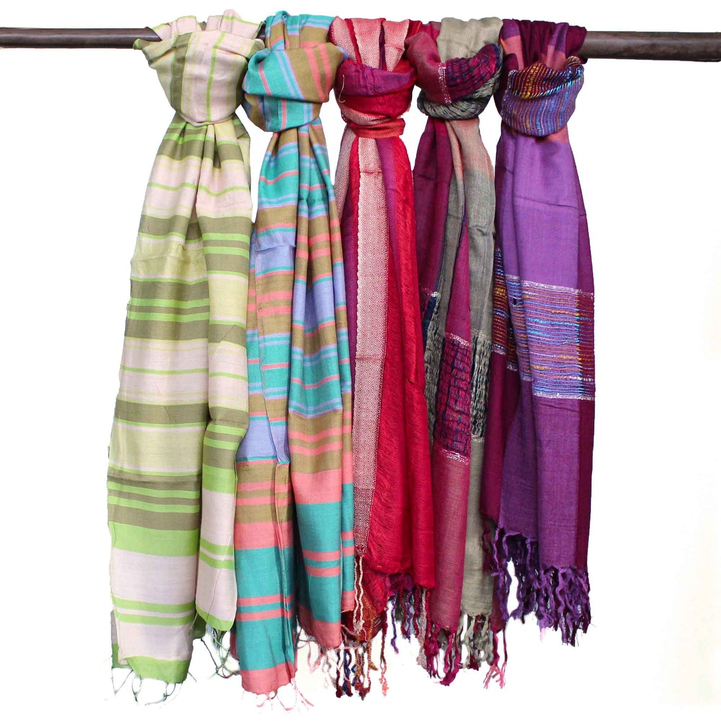 Close-up of a large bohemian-style scarf featuring a mix of vibrant purple patterns and traditional Indian textures.