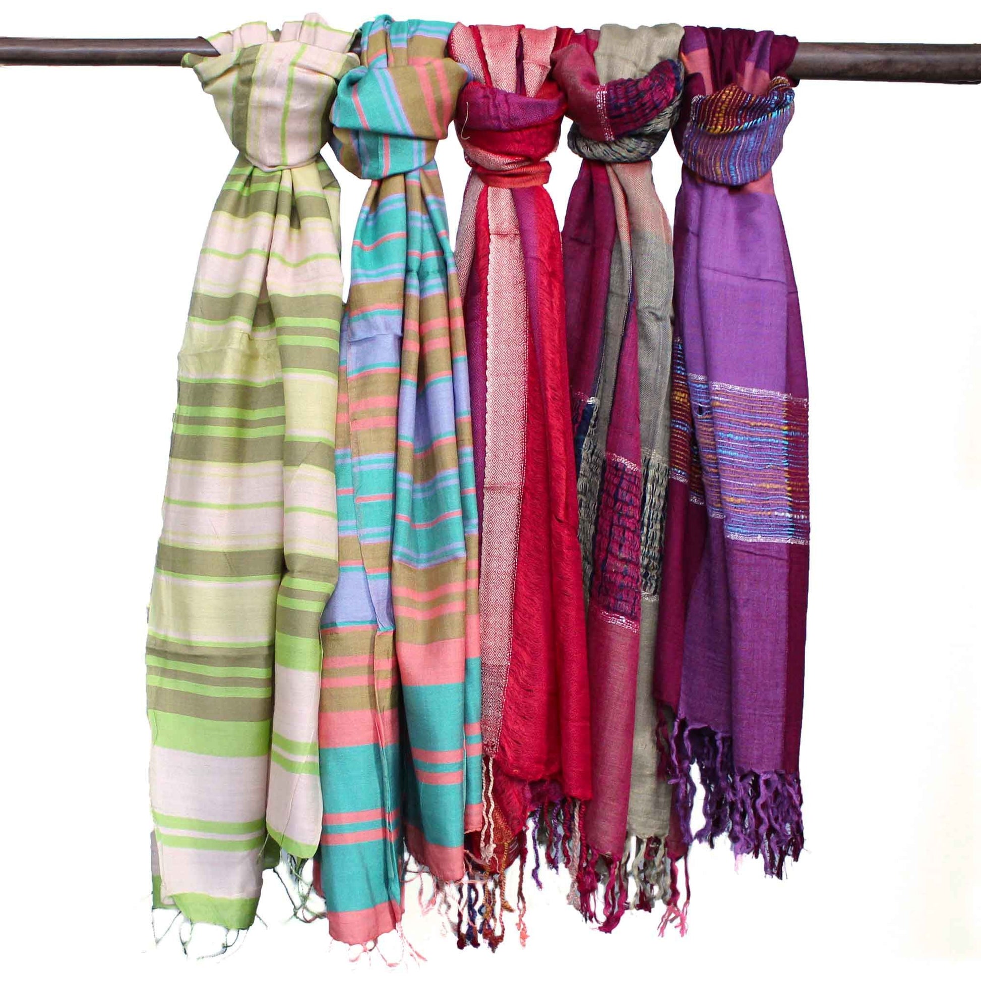 Close-up of a large bohemian-style scarf featuring a mix of vibrant purple patterns and traditional Indian textures.