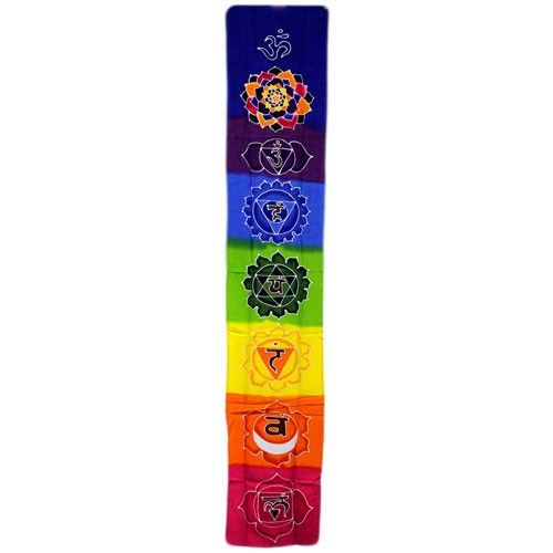 Long vertical rainbow chakra wall hanging featuring seven colourful symbols in a traditional Bali wax batik style.
