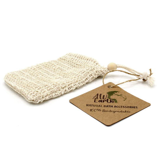 Textured natural beige washed jute soap bag with a drawstring top for exfoliating bath use.