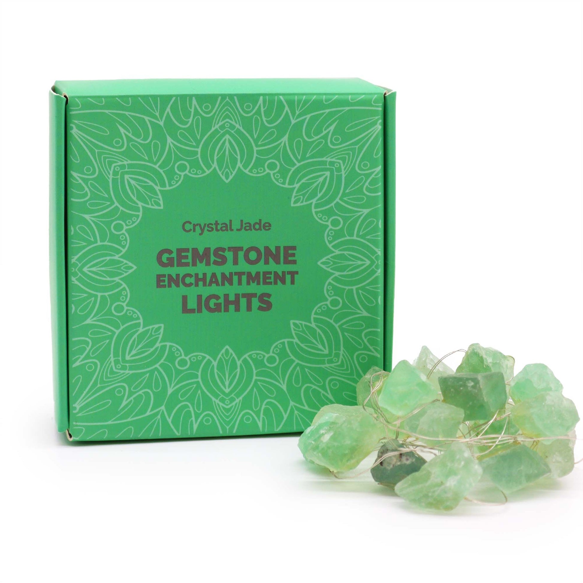 String of twenty green crystal jade gemstone rocks illuminated by warm LED lights creating a soft inviting glow.