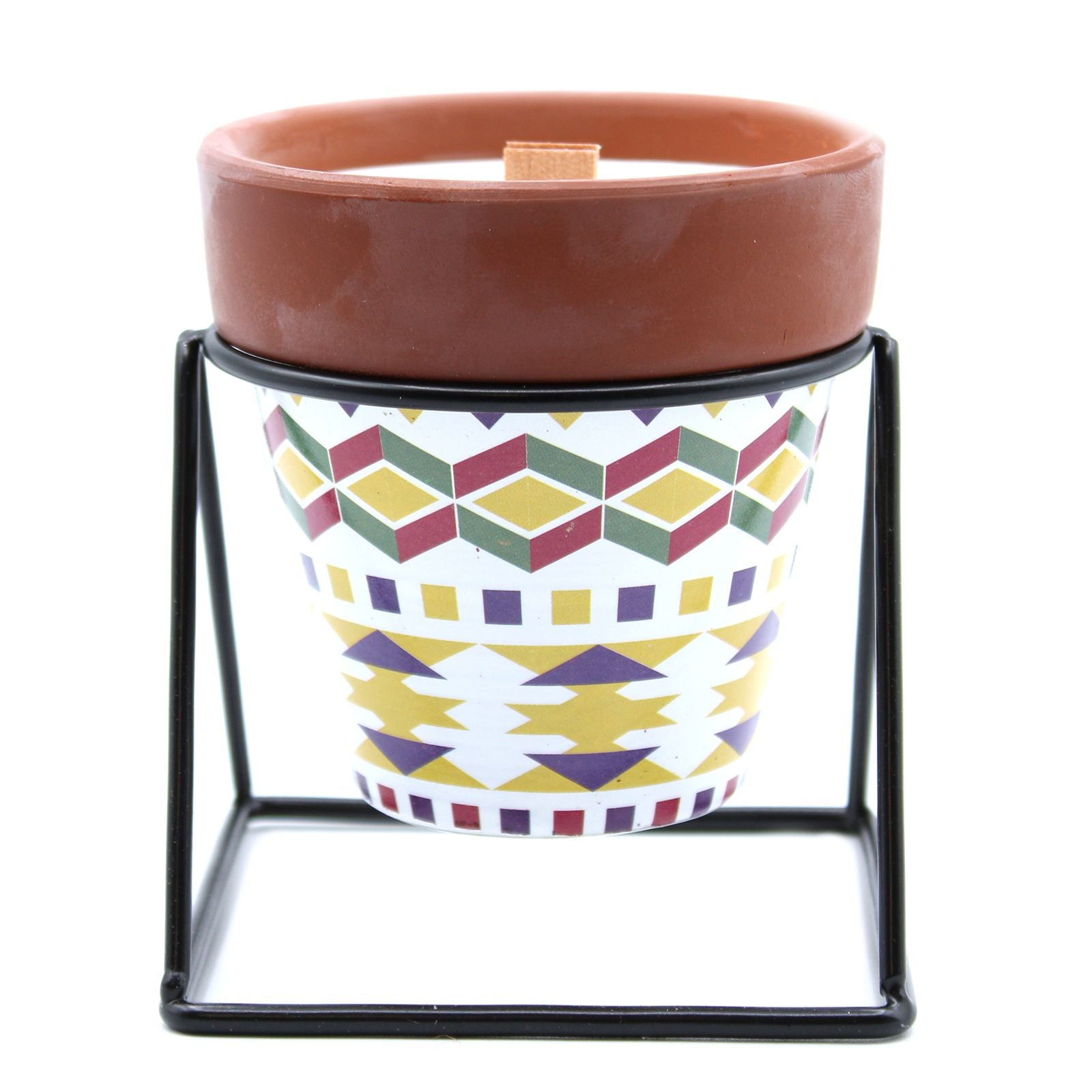 Hand-poured soy wax candle with a wooden wick inside a rustic terracotta pot, featuring a soft floral geranium scent.