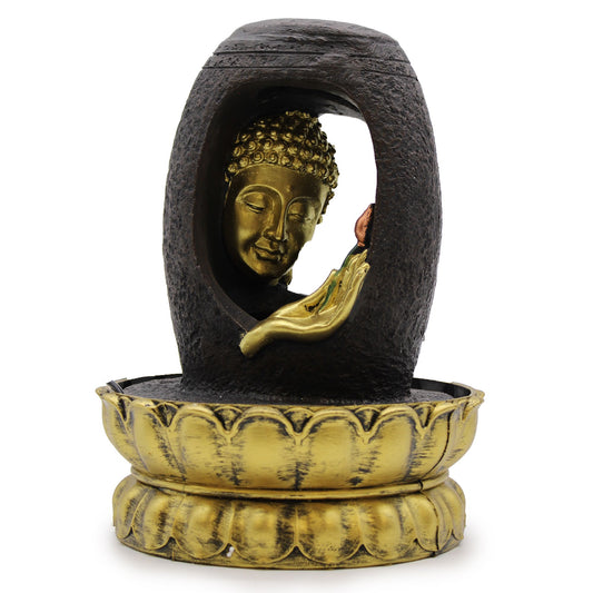 30cm golden Buddha statue in Vitarka Mudra pose seated on a tabletop water fountain with flowing water.