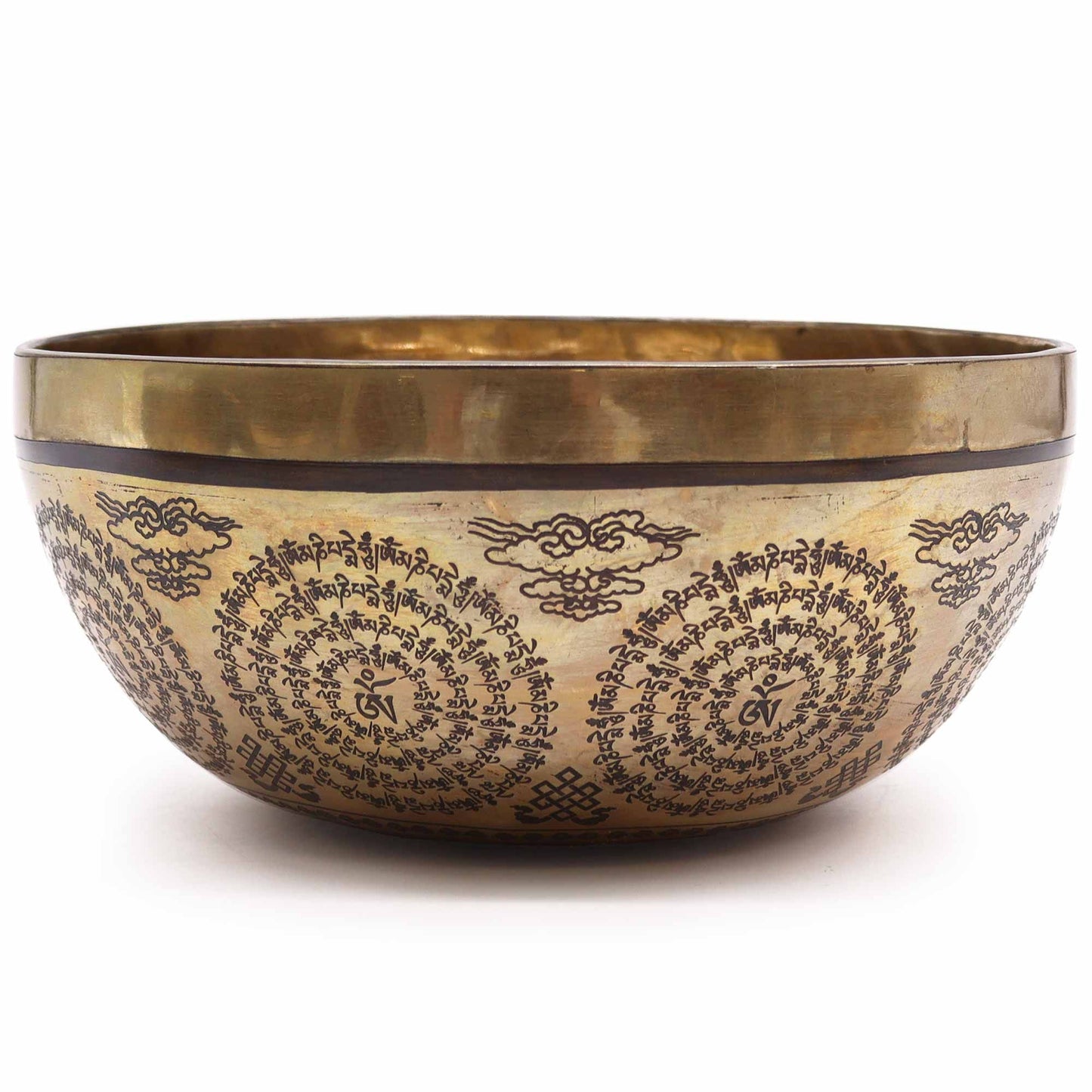 Large 21cm hand-engraved metal Tibetan singing bowl featuring intricate Om and Buddha symbols on a dark surface.