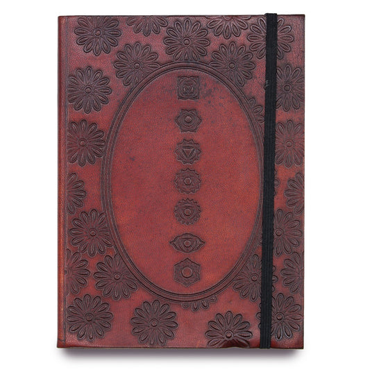 Small black notebook with an embossed colourful chakra mandala design and a functional elastic closure strap.