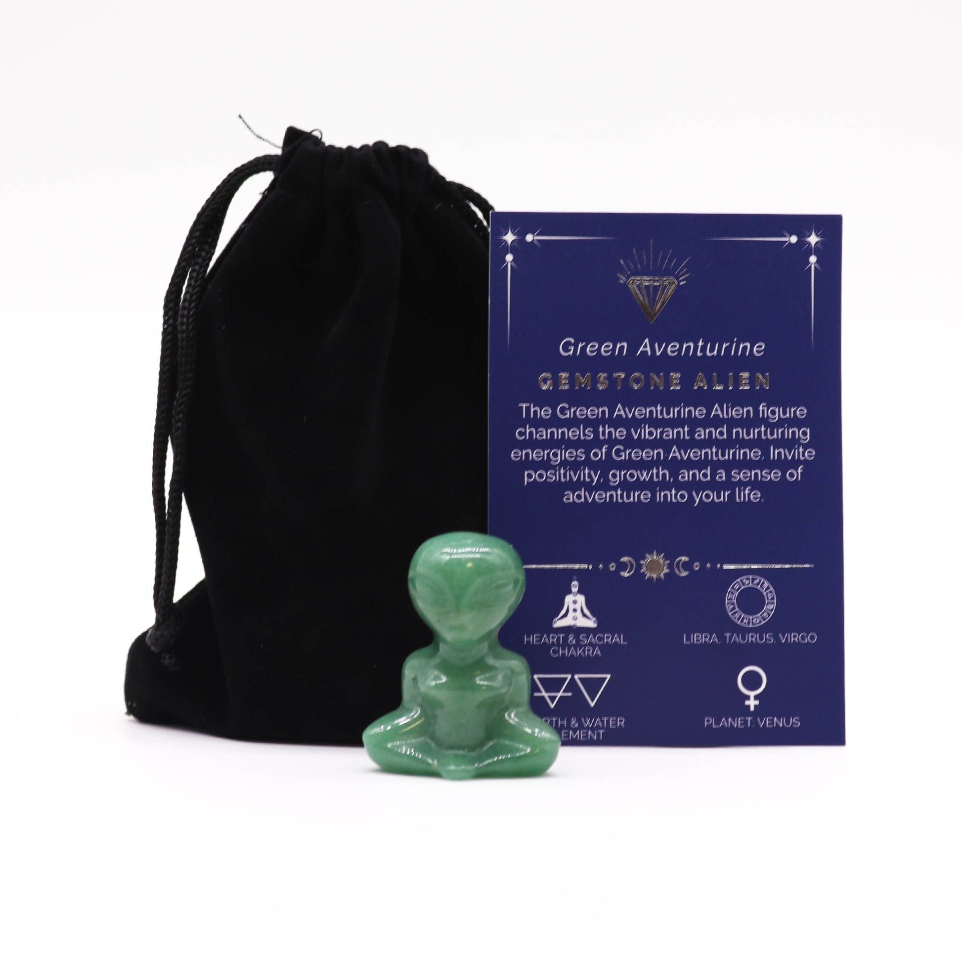 Small hand-carved alien figurine made from polished green aventurine gemstone with a smooth, mottled green finish.