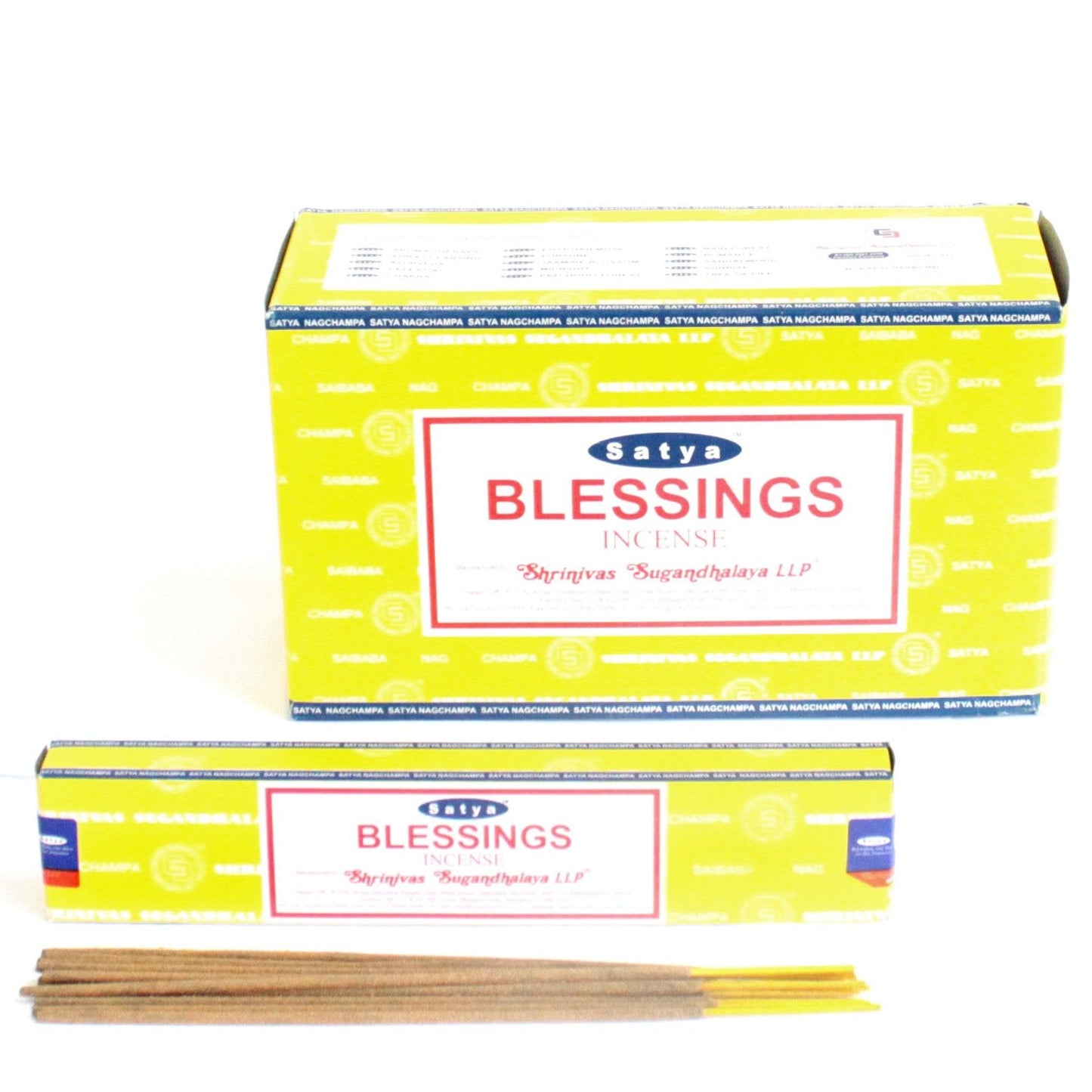 A pack of hand-rolled incense sticks with a traditional blue and white design and a single lit stick releasing smoke.