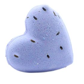 Heart shaped purple bath bomb with dried lavender botanicals on a white background.