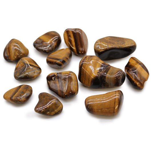Smooth, polished golden brown tigers eye tumble stone with a chatoyant silky lustre.