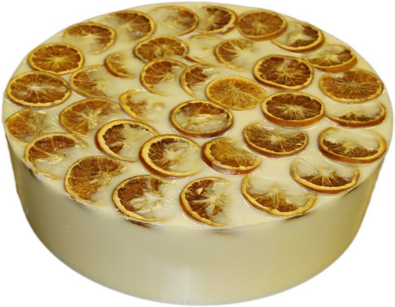 Large artisanal 10kg yellow soap loaf with a textured surface and vibrant citrus-inspired layers.
