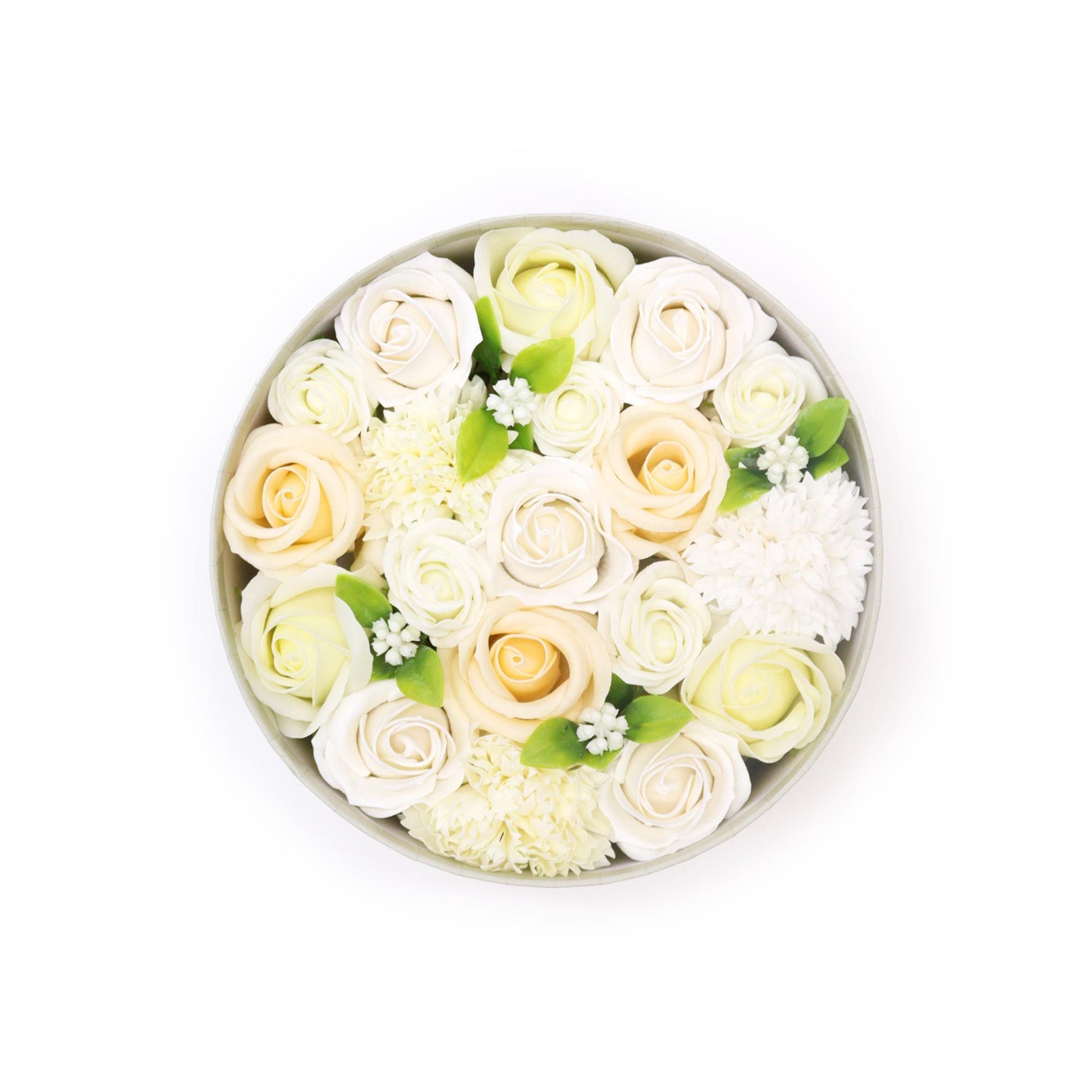 Elegant round gift box filled with realistic white and ivory soap flower roses and petals.